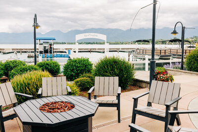 Outdoor patio with fire pit at Kwataqnuk Resort in Polson, MT