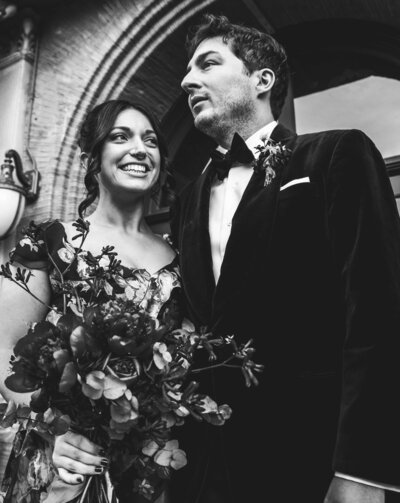 Black and white image of bride and groom on their wedding day