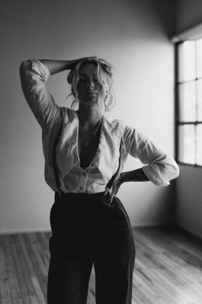 black and white artistic self portrait of Rue in studio