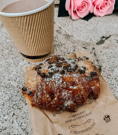 Coffee and Croissant in Paris by a destination wedding photographer