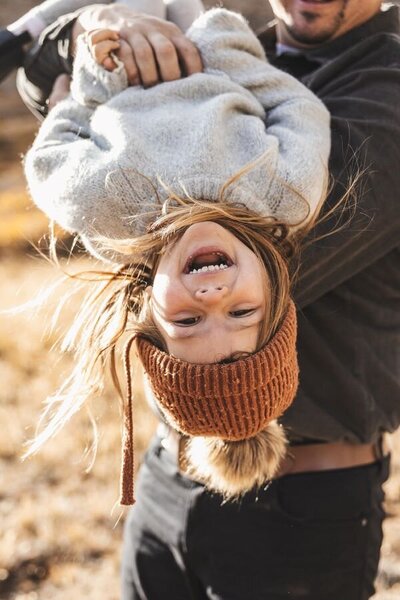 candid photo of girl laughing