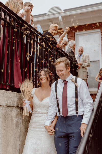 wedding photographer in ohio showcases couple during a confetti exit