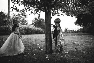 SUPER HERO DOCUMENTARY FAMILY PHOTOGRAPHY SESSION - LITTLE BOY POKING THE TREE