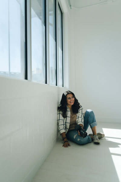 Max's Golden Hour photographer Alyssa Perez in a white studio branding