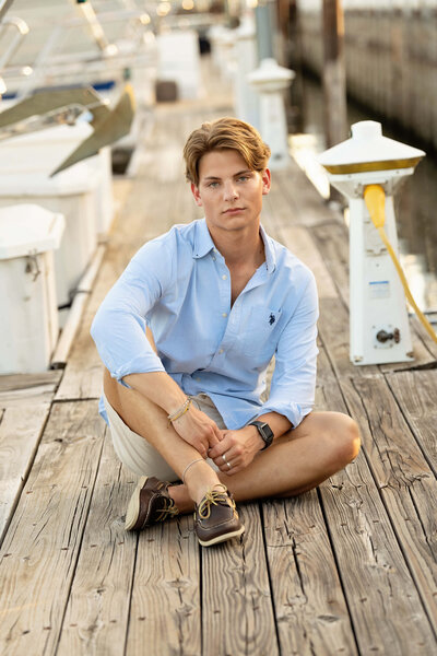 senior-guy-siting-on-dock