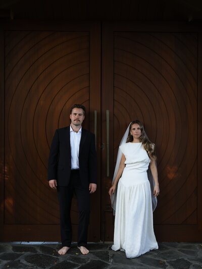 bride and groom walking down the aisle at outdoor wedding ceremony