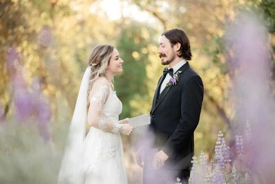 A bride and groom exchange vows in the spring in Yosemite. 