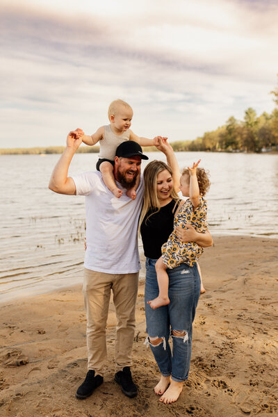 Family photo of a family of 4 in Constance Bay Ottawa beach