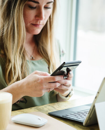 Realtor Tamara Rzan communicating with home buyers and sellers through her phone