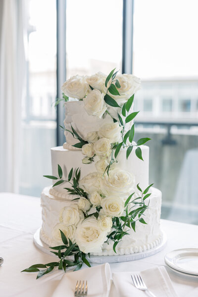 Atlanta Wedding Photographer | Three Tier White Wedding Cake With White Florals