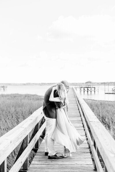 bride and groom kissing during first dance