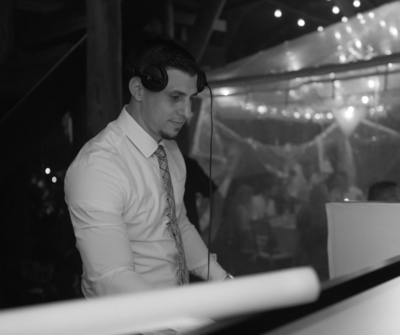 Professional DJ and MC services for corporate events, weddings, and private celebrations