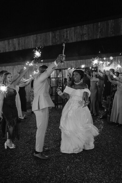 wedding-sparkler-exit-champagne-spray-photo