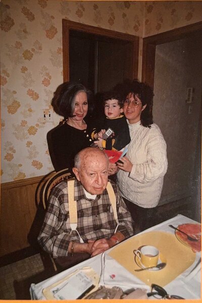 A family celebrating with a grandfather