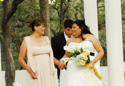 Irene Castillo of Expose The Heart Photography walking down the aisle with her mother