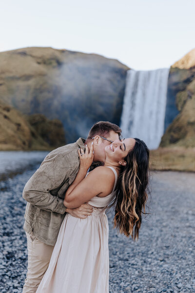 Iceland Wedding Photographer captures groom kissing womans neck