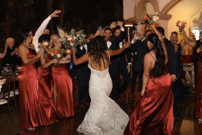 Weddings in Newport Beach wedding party dancing on dance floor at reception