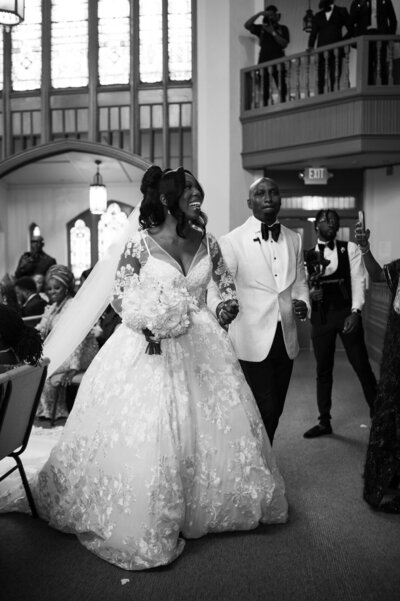 Nigerian couple exiting their wedding ceremony in Atlanta, GA
