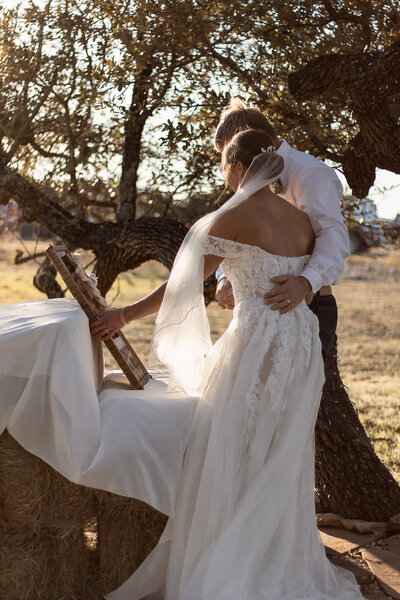 Engaged couple kissing.