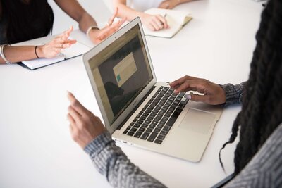 woman looking at laptop