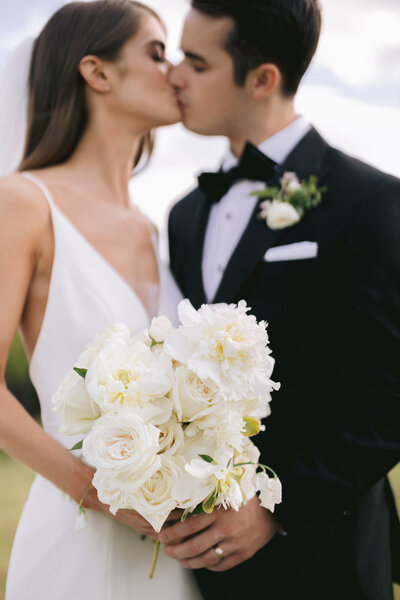 Bride and Groom portrait with white bouquet