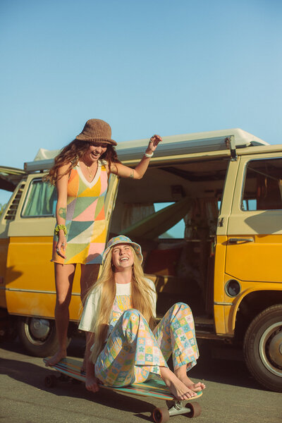 two California girls on a skateboard during their branding shoot