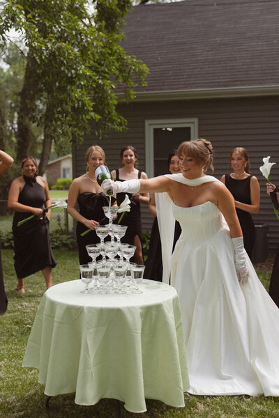 Bride & groom Kissing during cake cutting at the Van Dusen Mansion