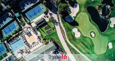 Aerial view of an outdoor wedding ceremony at the Marbella Country Club