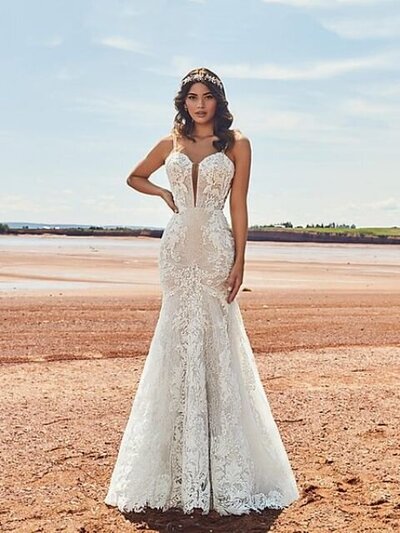 Beaded lace Mermaid silhouette Spaghetti straps Structured bodice with pearl details Cascading train