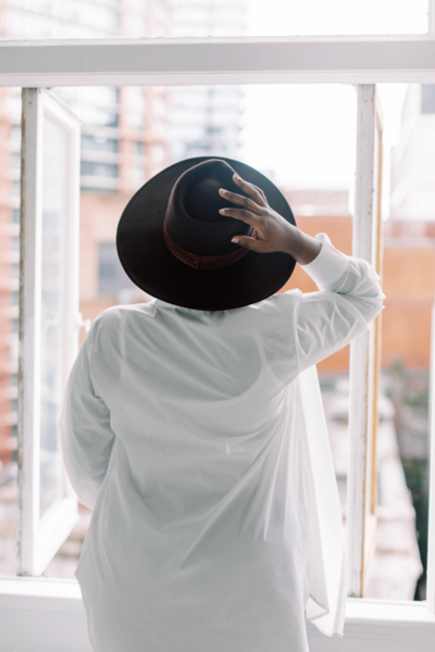 Confident woman in white jacket