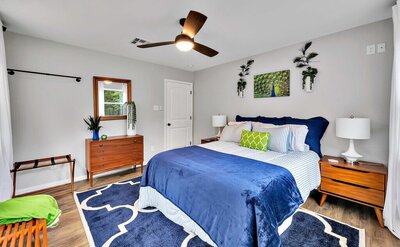 Adjustable Queen size bed in this 2-bedroom, 2-bathroom bungalow on the Brazos River outside Waco, TX