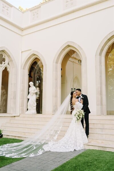 Newlyweds posing during their luxury wedding in Houston TX.