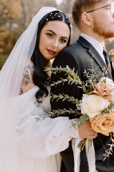 A romantic portrait of a bride and groom.