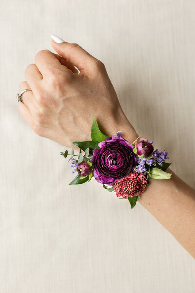 wrist corsage for bold and unique jewel-tone design plan