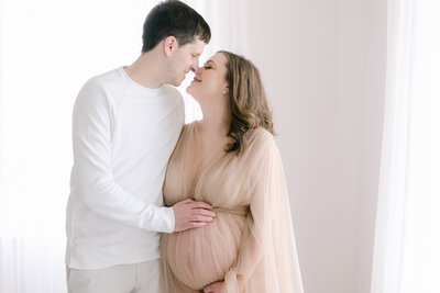 Maternity photo shoot with couple's first baby.