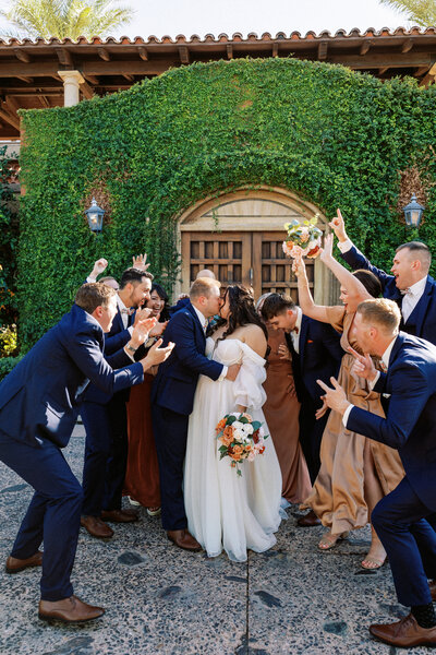 Scottsdale Arizona Wedding couple celebrating with their wedding party.