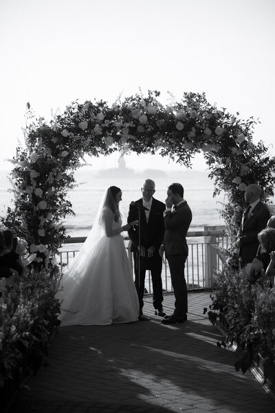 Wedding reception in front of the statue of liberty at liberty warehouse venue