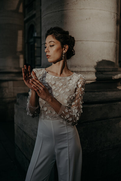 Emotive portrait of a bride captured in delicate natural light in the center of Bordeaux