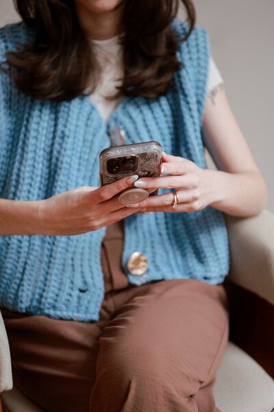 Liz, a Baltimore-based wedding content creator, smiling at the camera