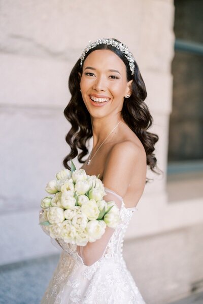Wisconsin Wedding Photographer Bride holding bouquet - Taken by Emily Barbara.