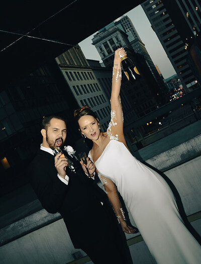 Bride and Groom Celebrating in Cincinnati Rooftop