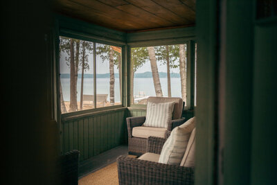 Patio furniture in cabin on lake