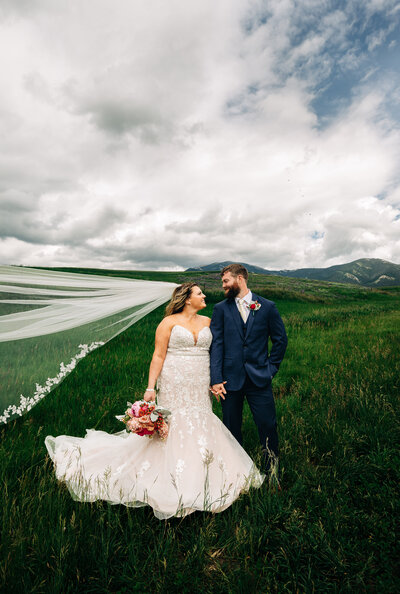 Bride and Groom on wedding day in Bozeman Montana with Bridger mountains in background