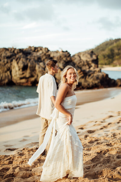 Happy bride on beach