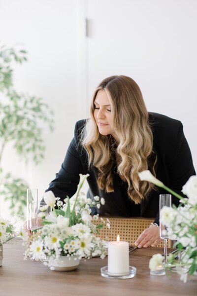 Carissa designing a tablescape