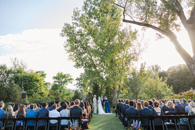 Omaha Zoo wedding ceremony photographed by Claire Katan Creative at the Harper Event Center.