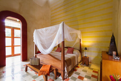 bedroom in a beautiful hacienda for a yoga retreat in Mexico