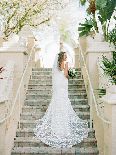 Bride and groom walk up memorial steps at their DC wedding