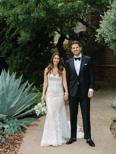 Bride and groom smiling