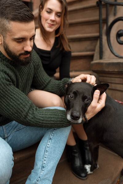 Couple hanging out on stoop with their dog, Providence RI